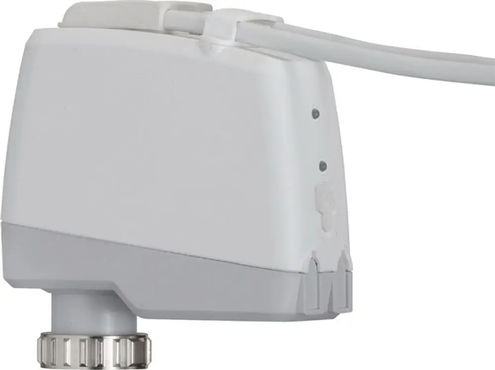 Weißer motorischer Stellantrieb mit Anschlusskabel, seitlichem Einstellrad und Statusanzeigen, hergestellt von IMI Hydronic Engineering.